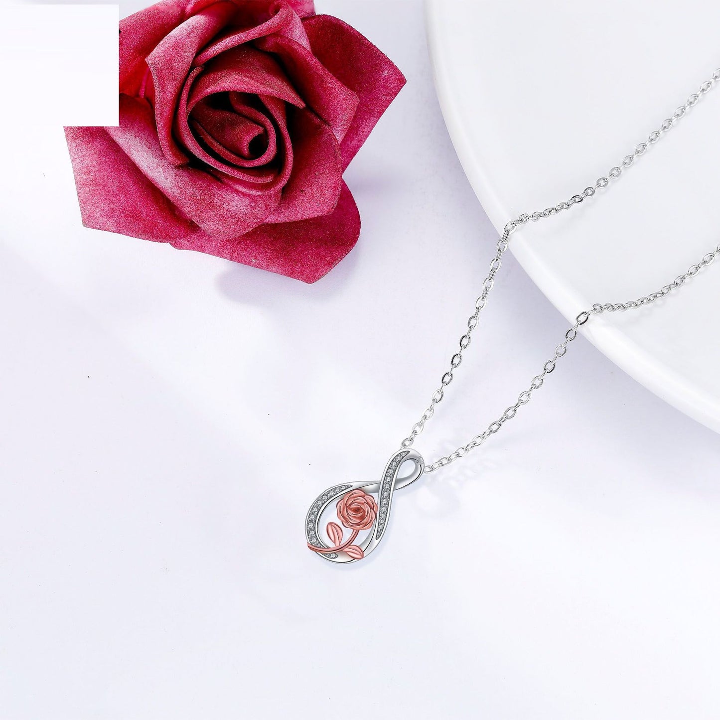 Oändlighetssymbol roséfärgat halsband